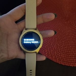 Rose Gold Samsung galaxy watch.